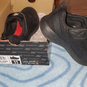 Black sketcher shoes